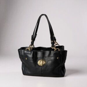 Coach Penelope black pebbled leather shoulder bag with a turn-lock closure